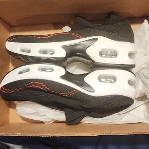 Black and White Sneakers with Red Accents